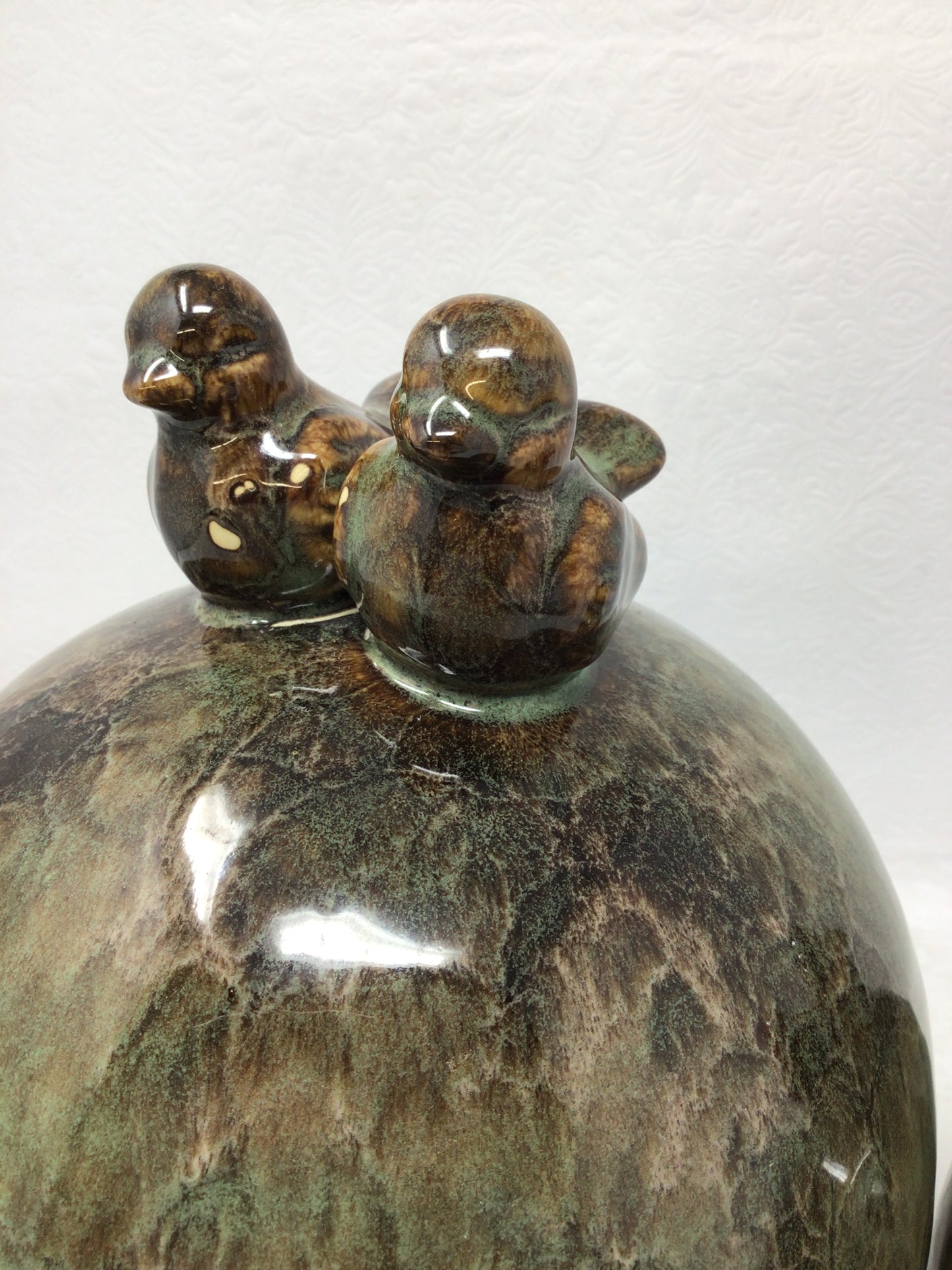Pair of Glazed Ceramic Orbs with Birds