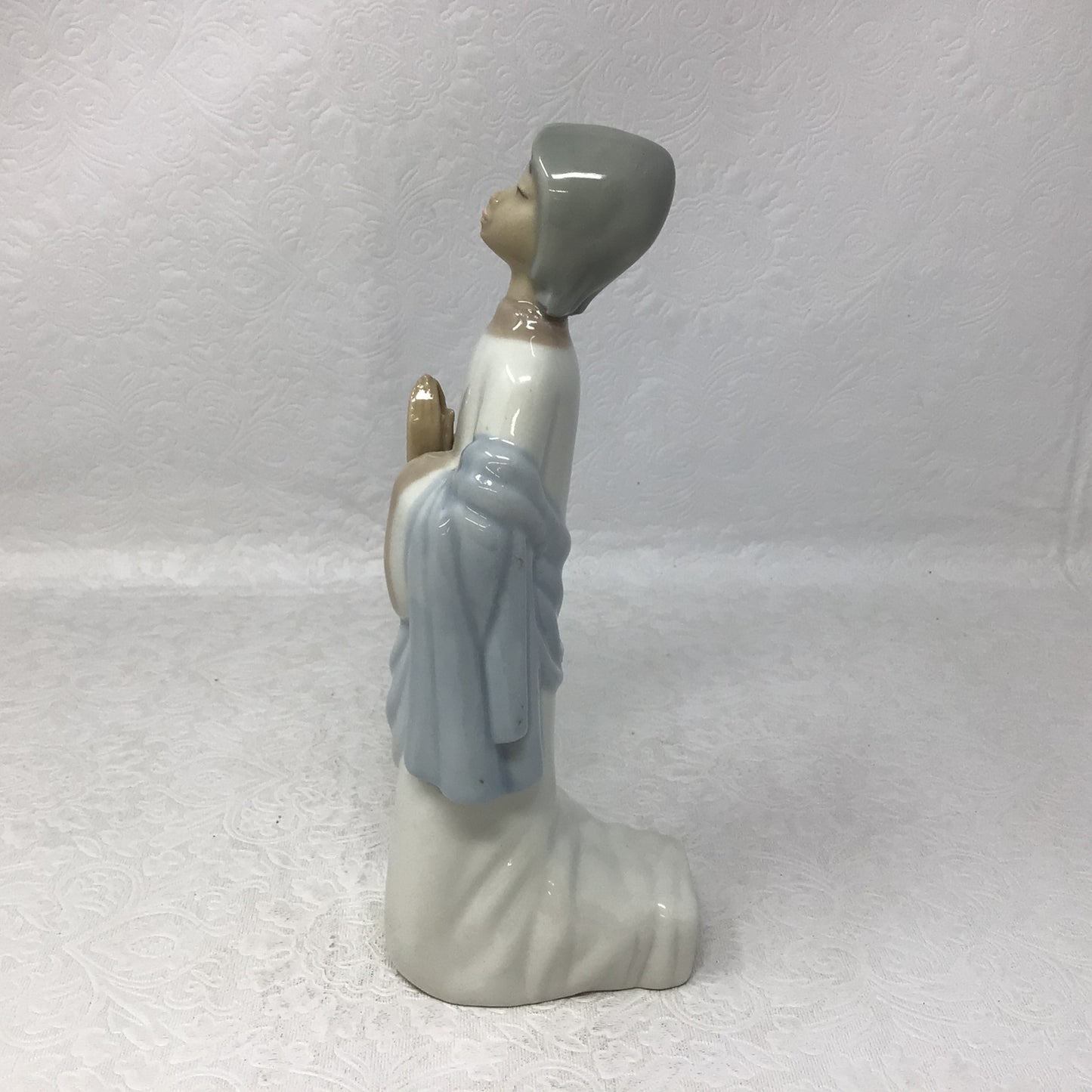 Porcelain Praying Figurine
