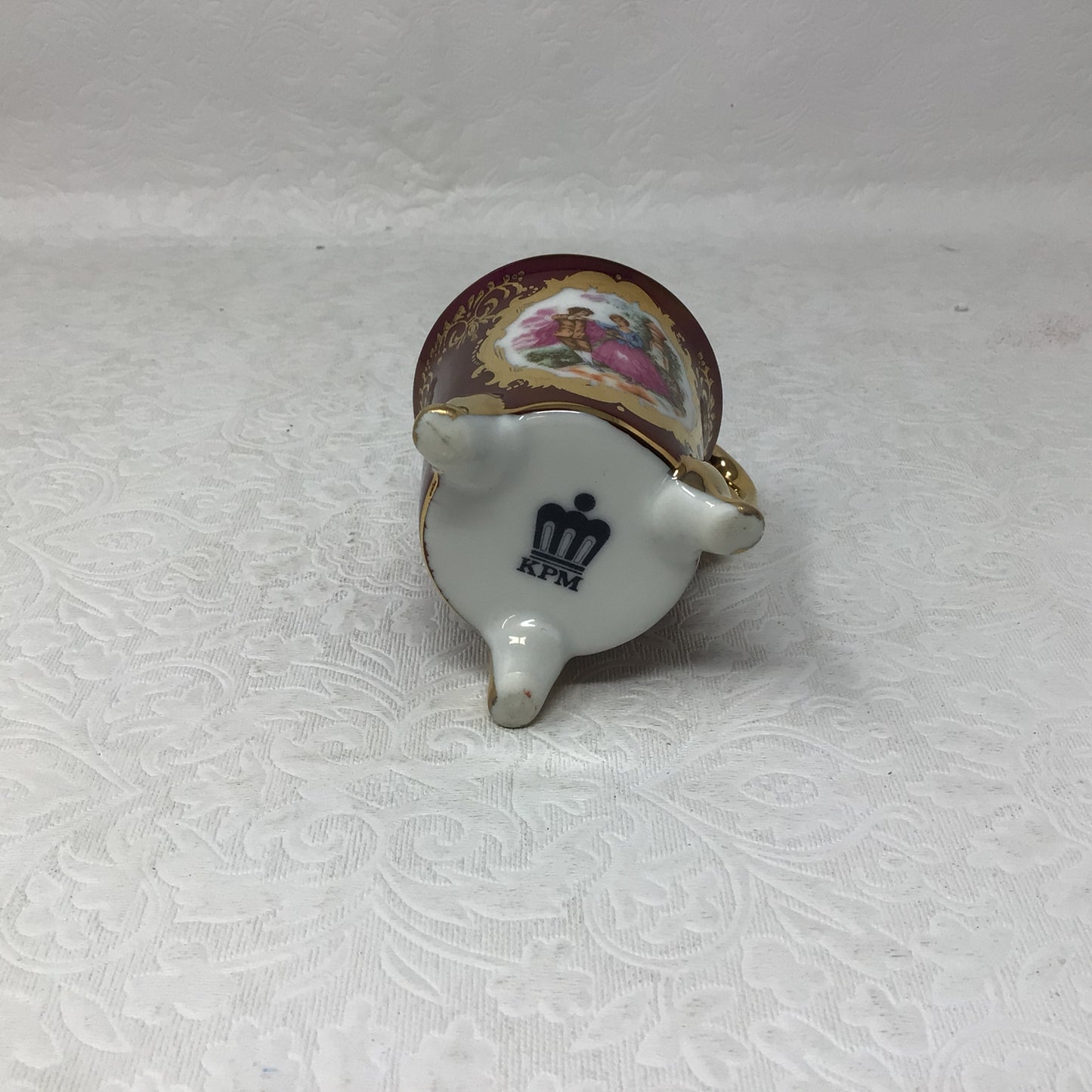 KPM Porcelain Head Handle Footed Teacup