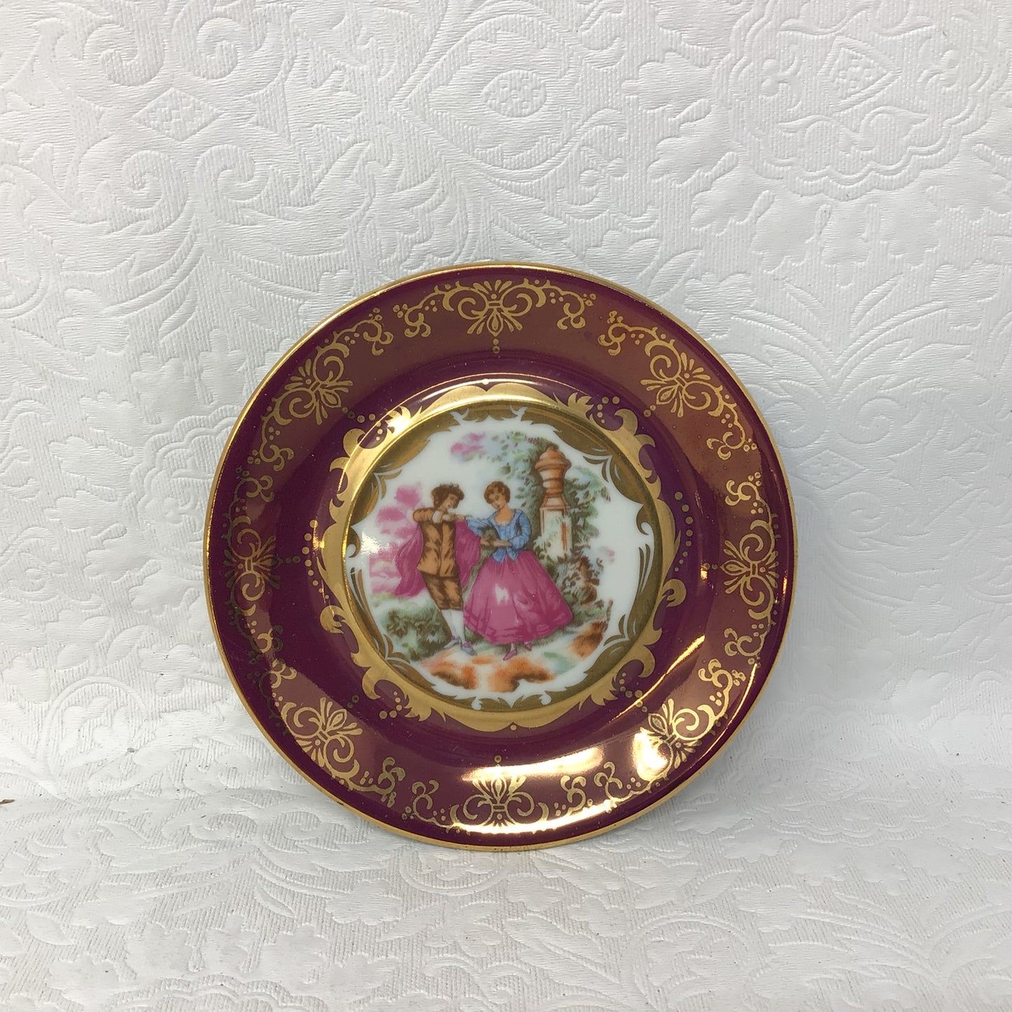 KPM Porcelain Head Handle Footed Teacup