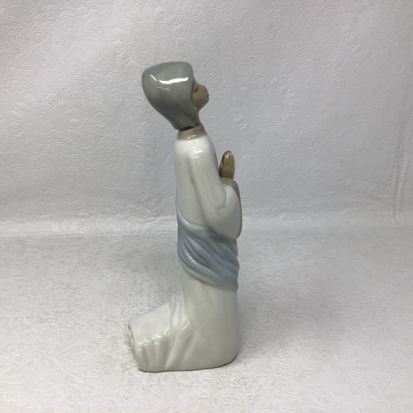 Porcelain Praying Figurine