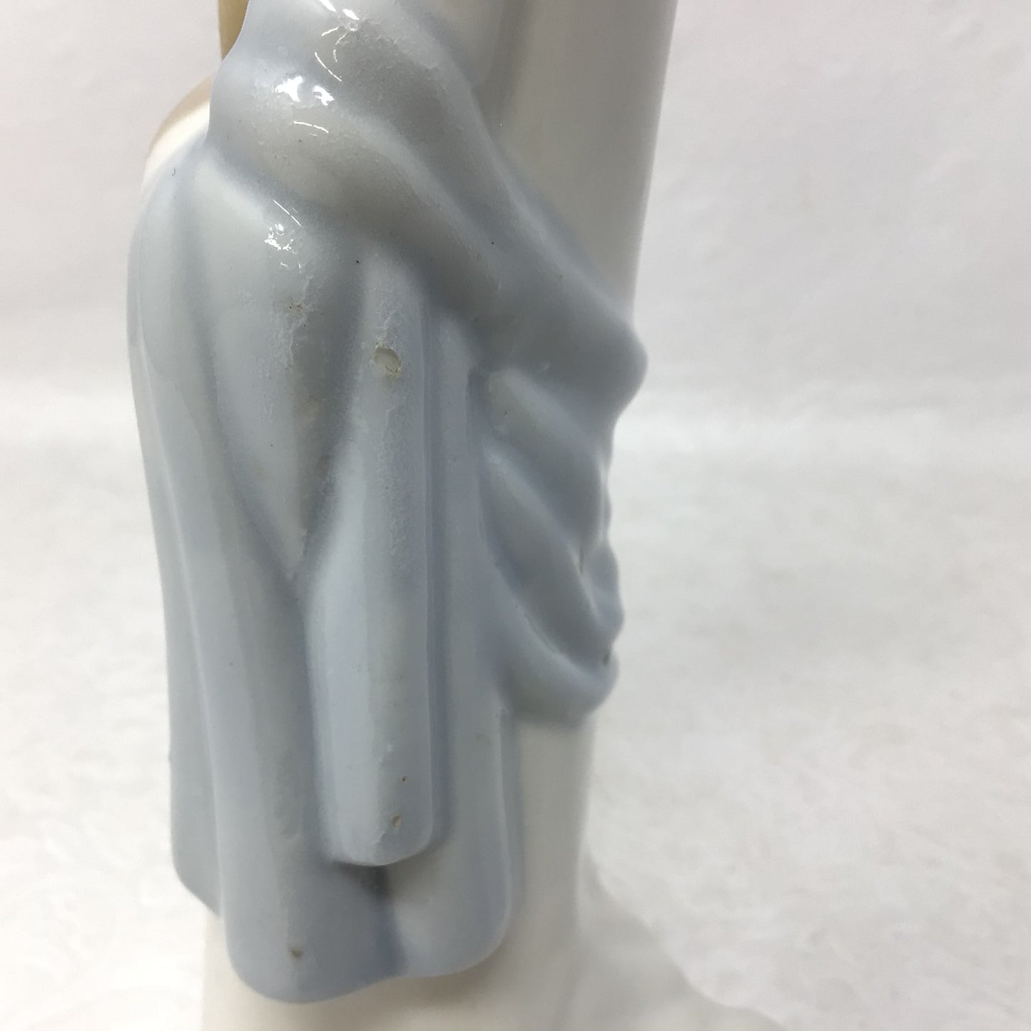 Porcelain Praying Figurine