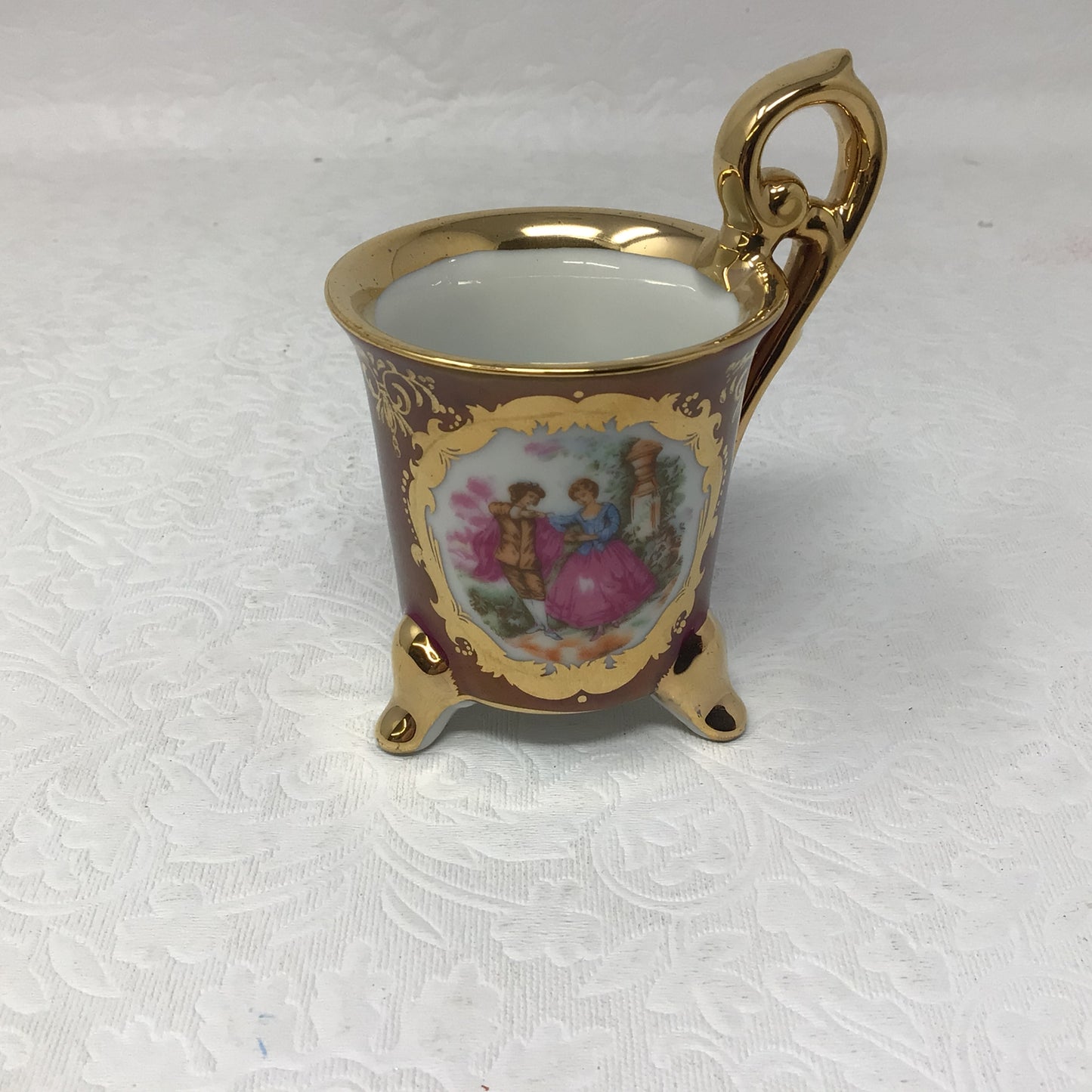 KPM Porcelain Head Handle Footed Teacup