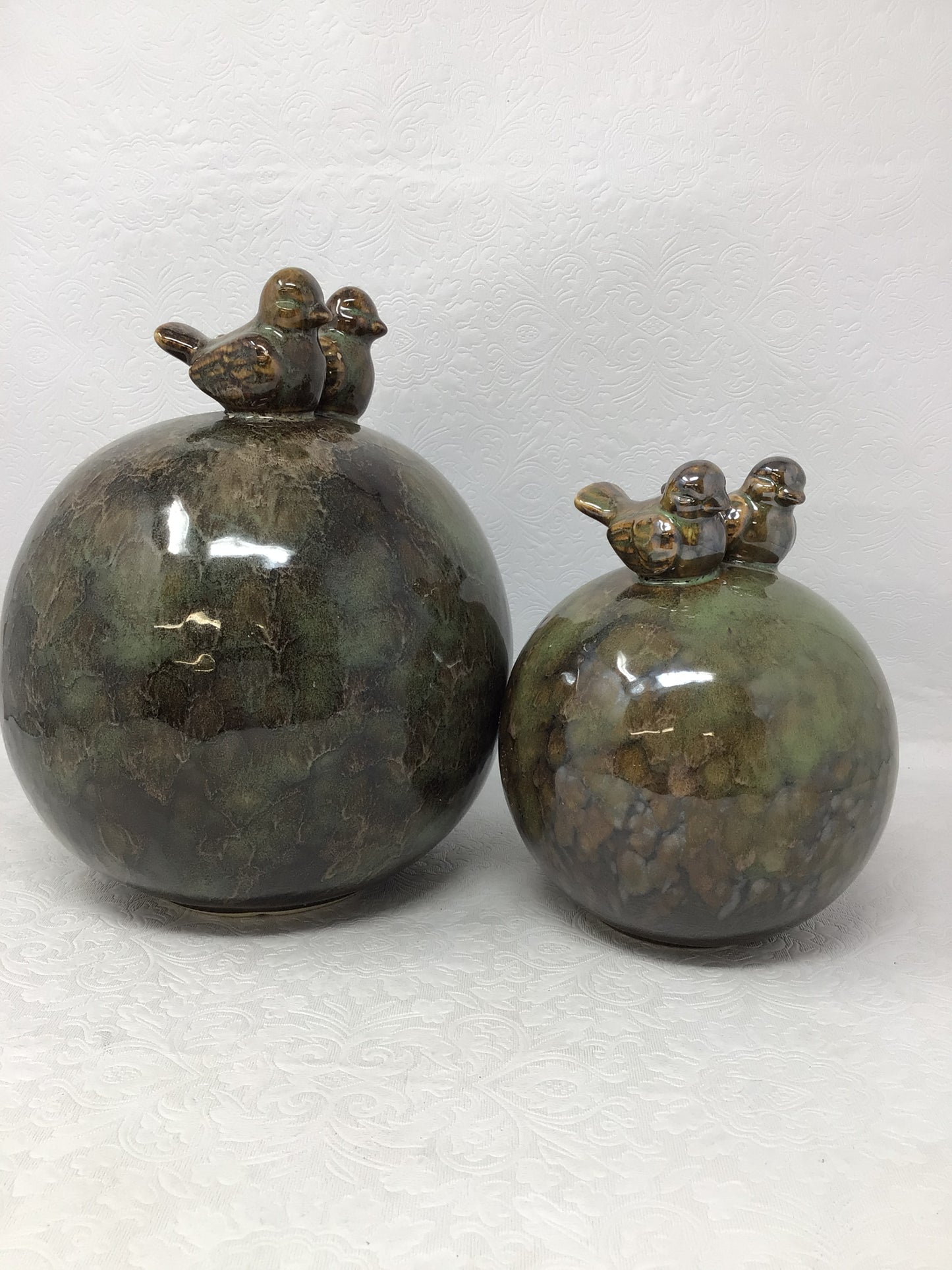 Pair of Glazed Ceramic Orbs with Birds