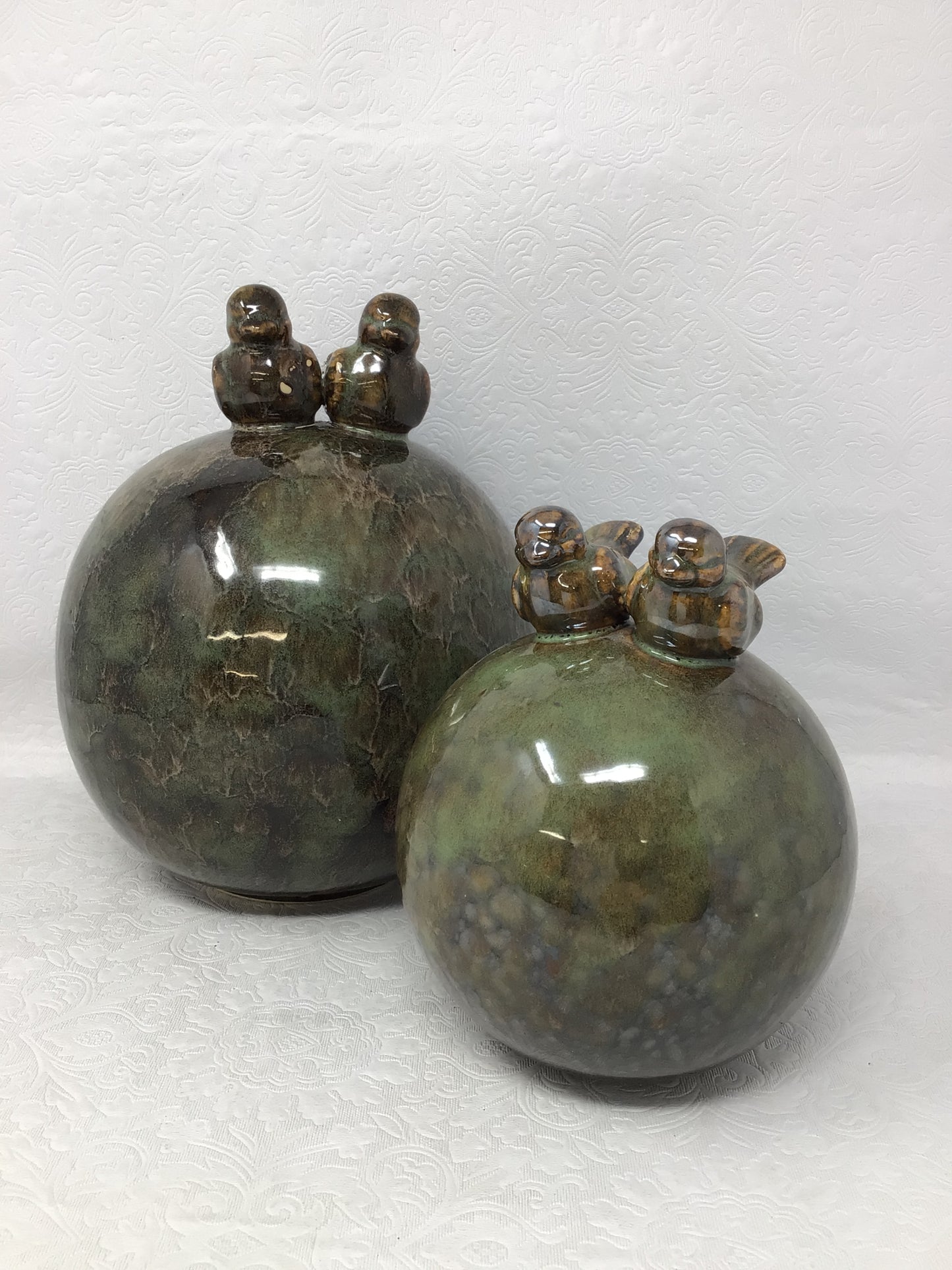Pair of Glazed Ceramic Orbs with Birds