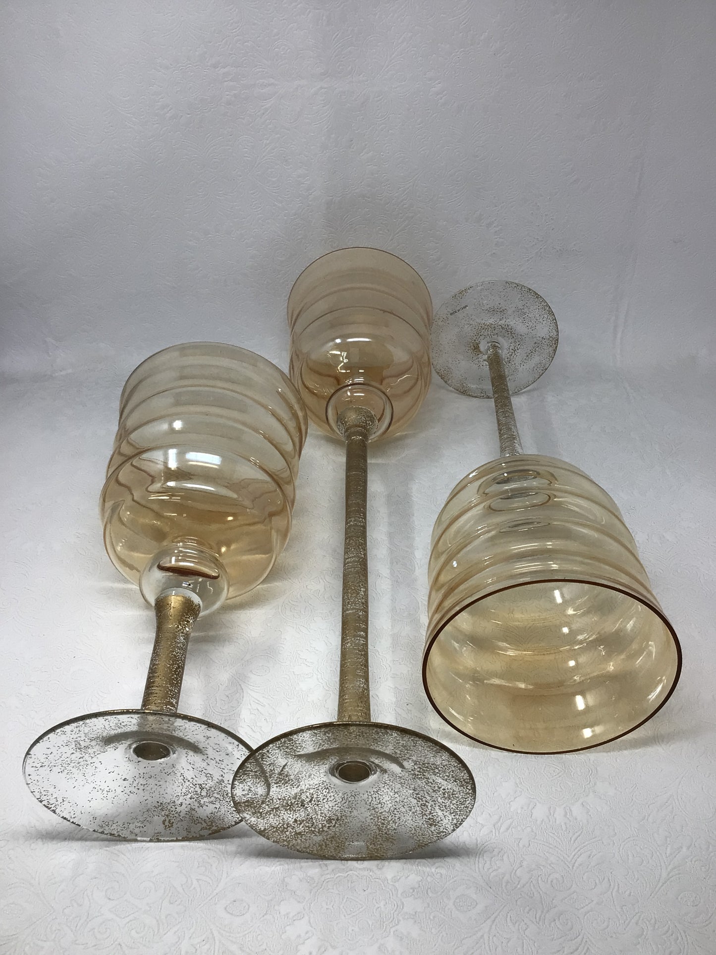 Set of Three Gold Colour Standing Vases