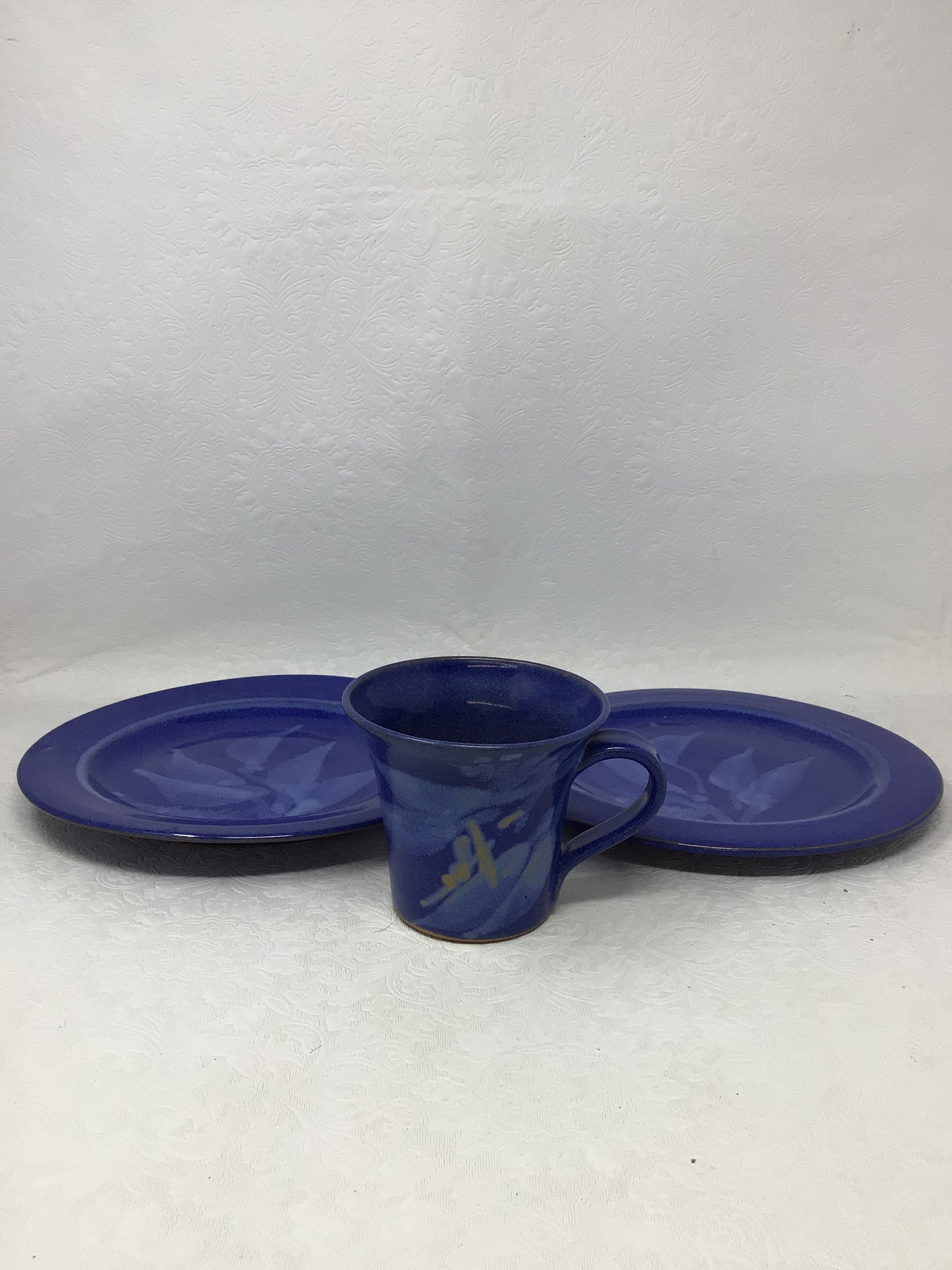 Blu-Glazed Mug and Two Plates