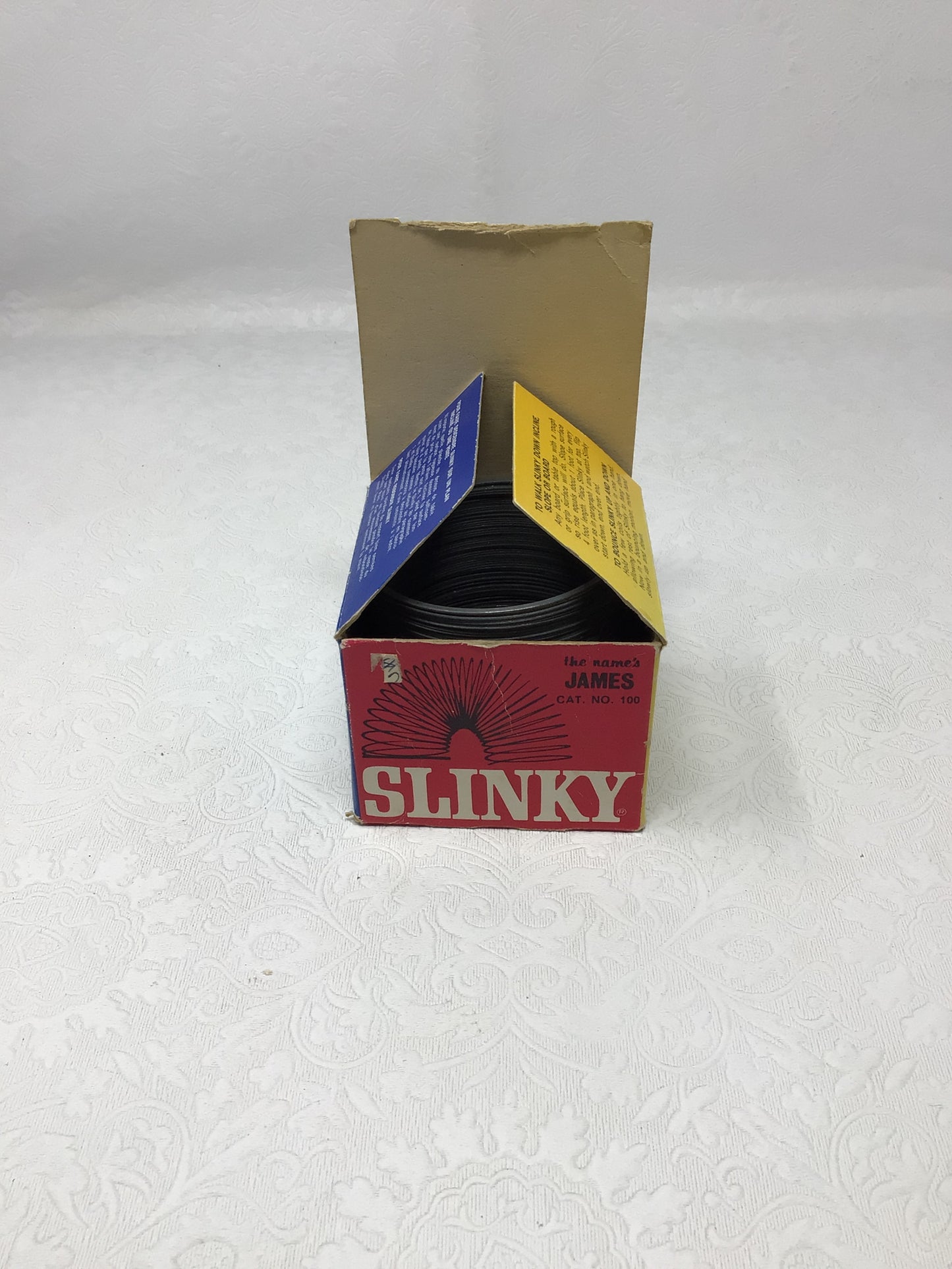 Vintage James Industries Metal Slinky Toy