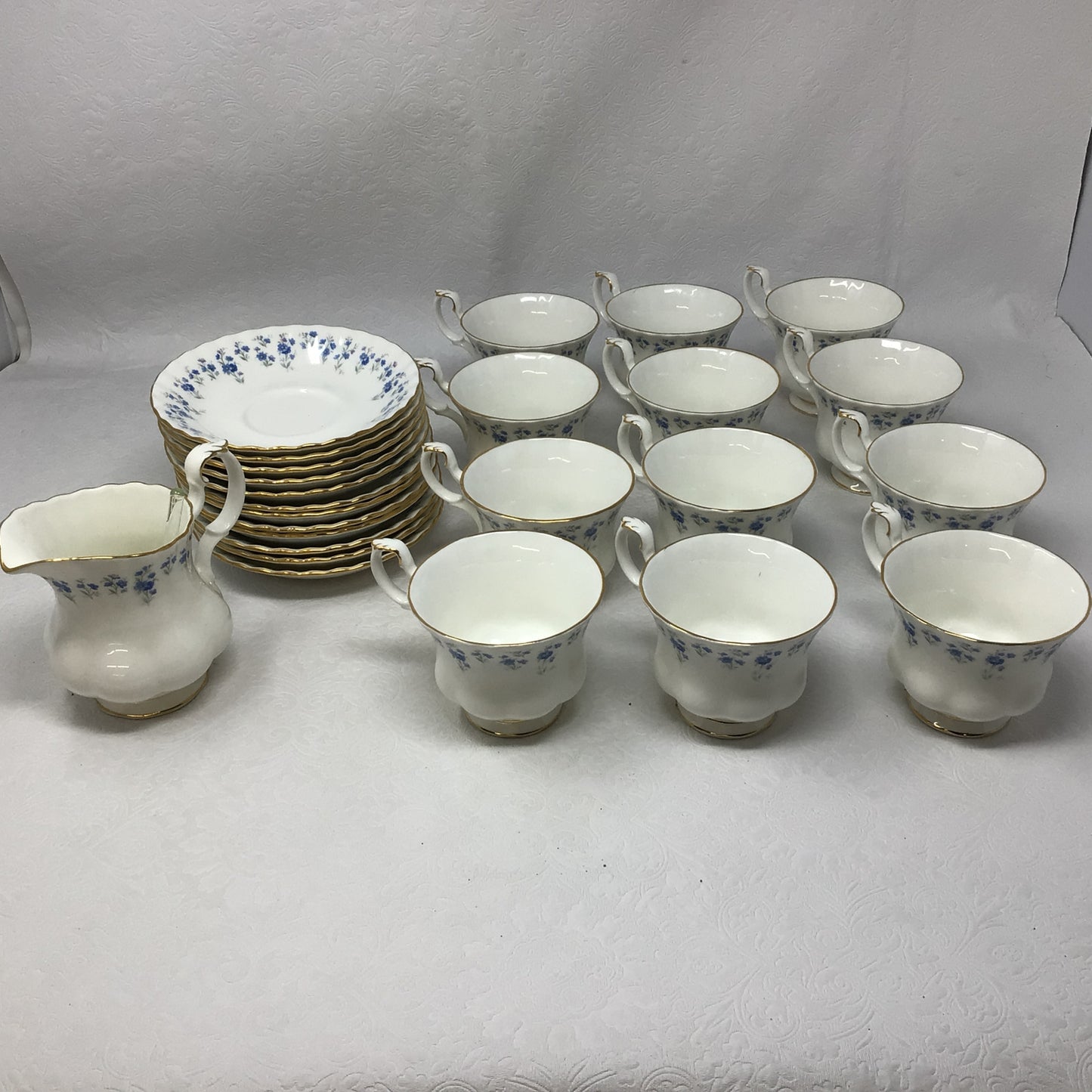 Royal Albert “Memory Lane” 12-piece Tea Cups and Saucers with Creamer