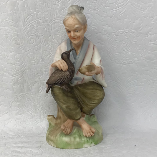 Napco Figurine Japan Old Woman With Bird Ceramic Pottery