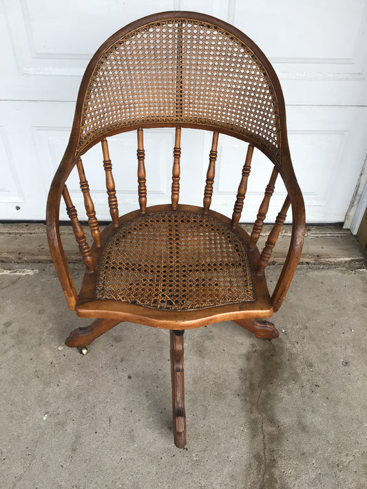 Vintage Oak Cane-back Swivel Banker's Chair