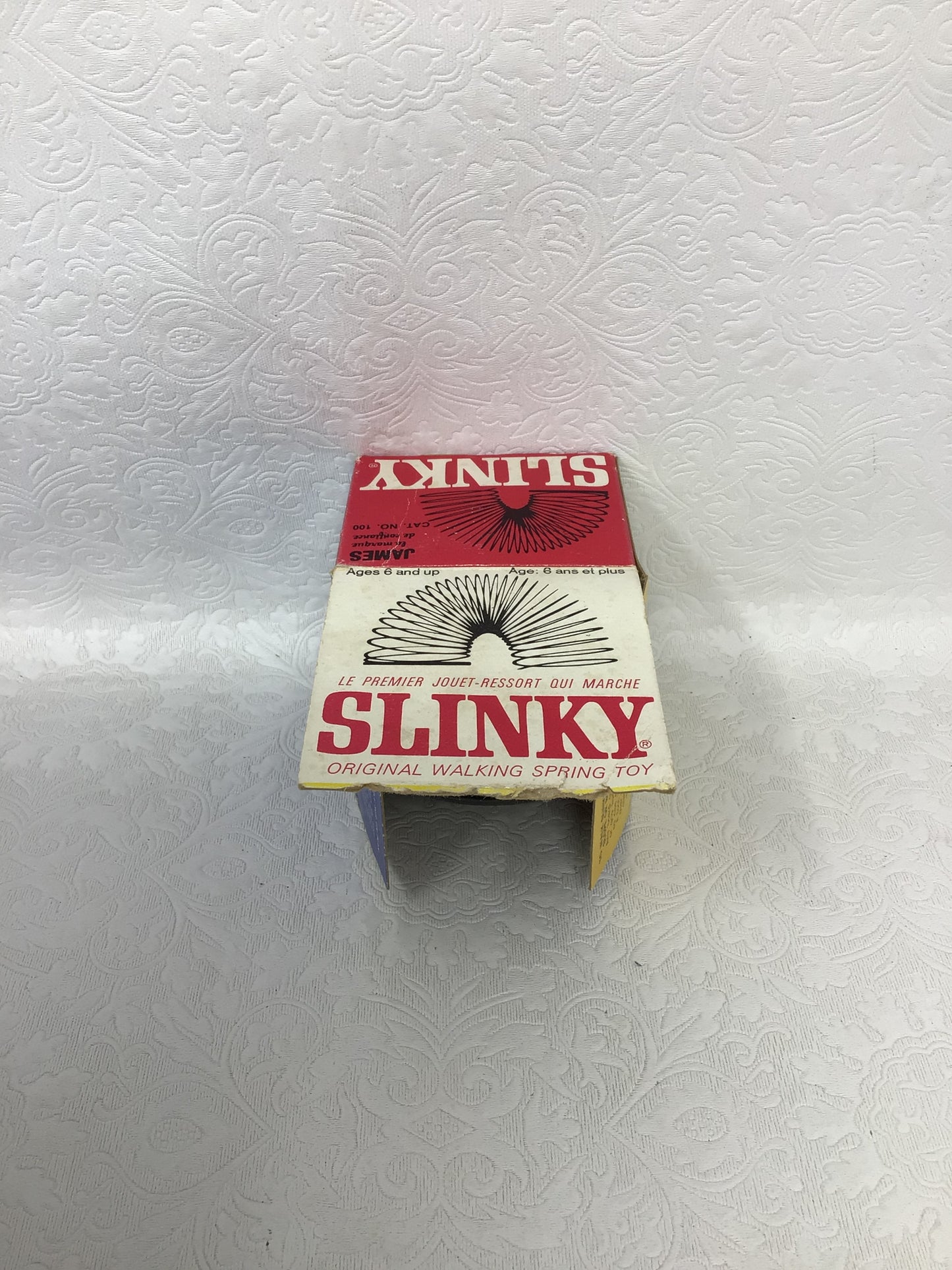 Vintage James Industries Metal Slinky Toy