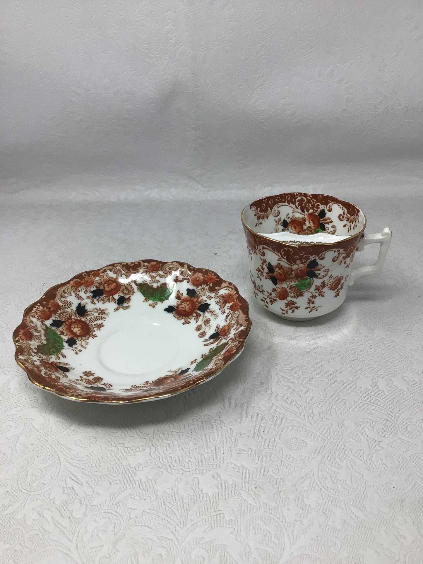 Antique Moustache Cup & Saucer