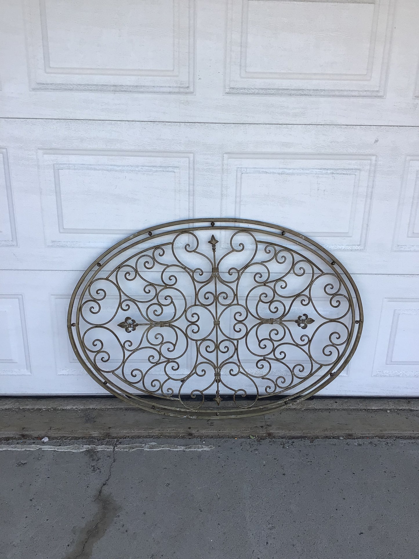 Ornate Oval Metal Wall Decor Piece