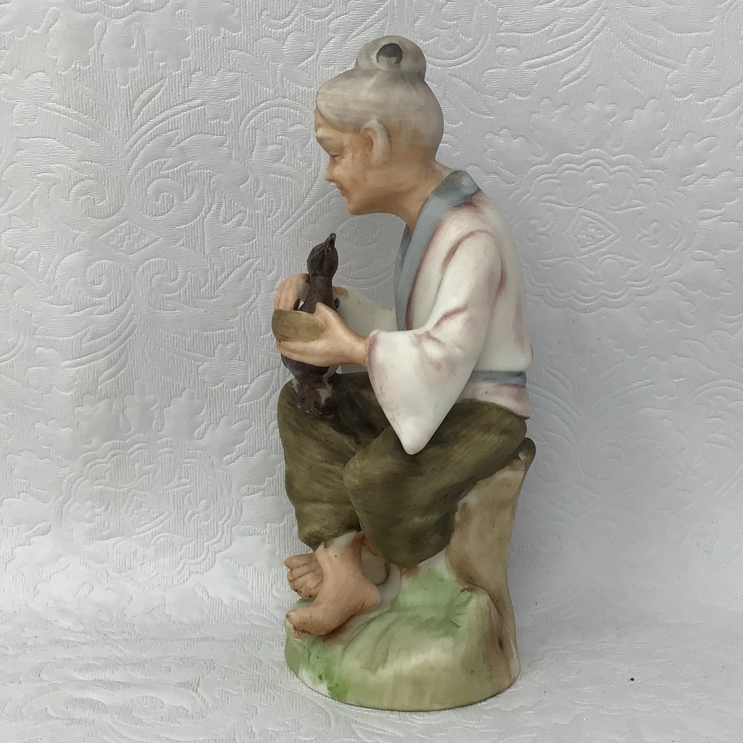 Napco Figurine Japan Old Woman With Bird Ceramic Pottery