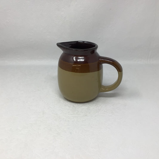 Tan and Brown Pottery Jug