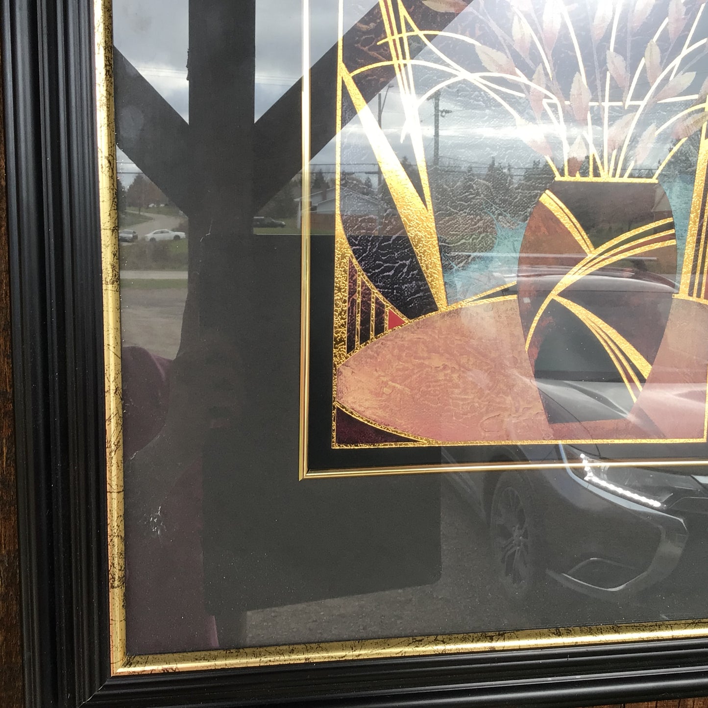 Print In Black And Gold Frame