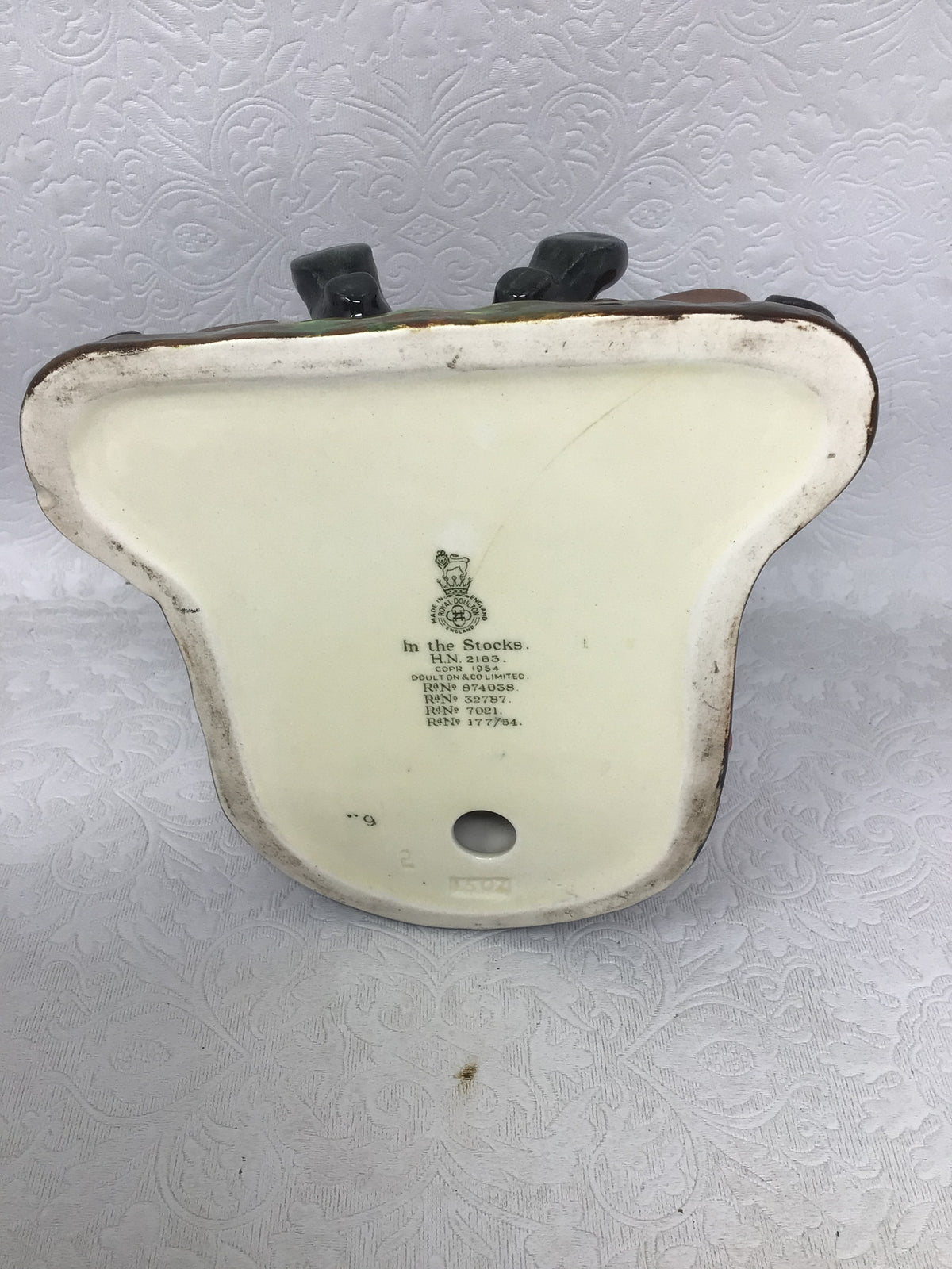 “In The Stocks” Figurine