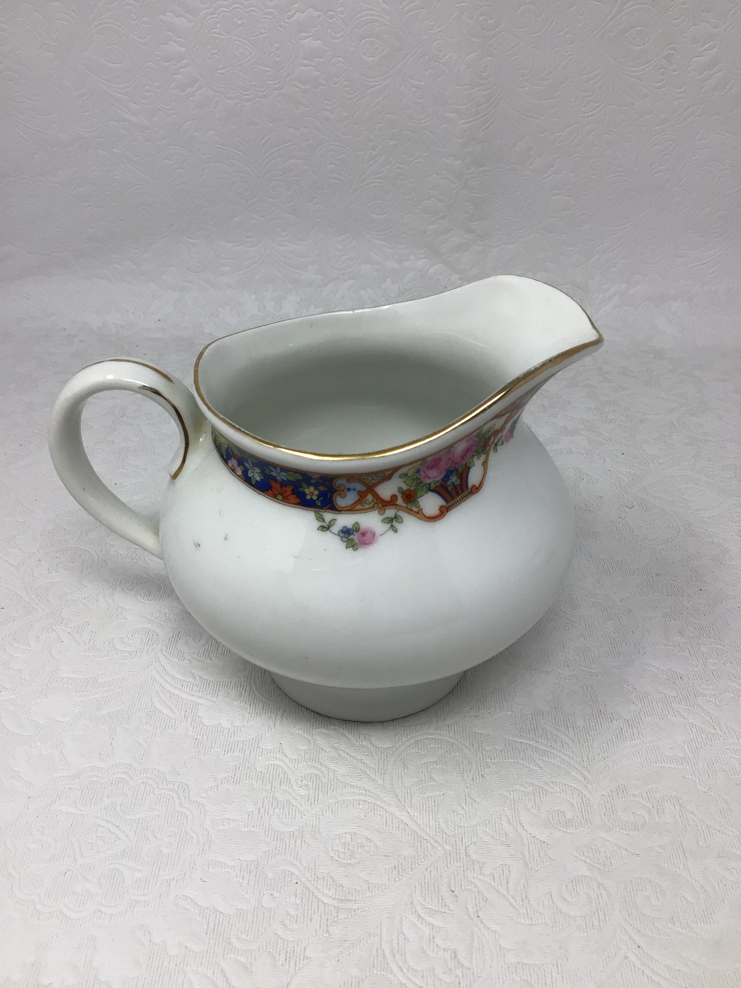 Porcelain Creamer and Sugar Bowl