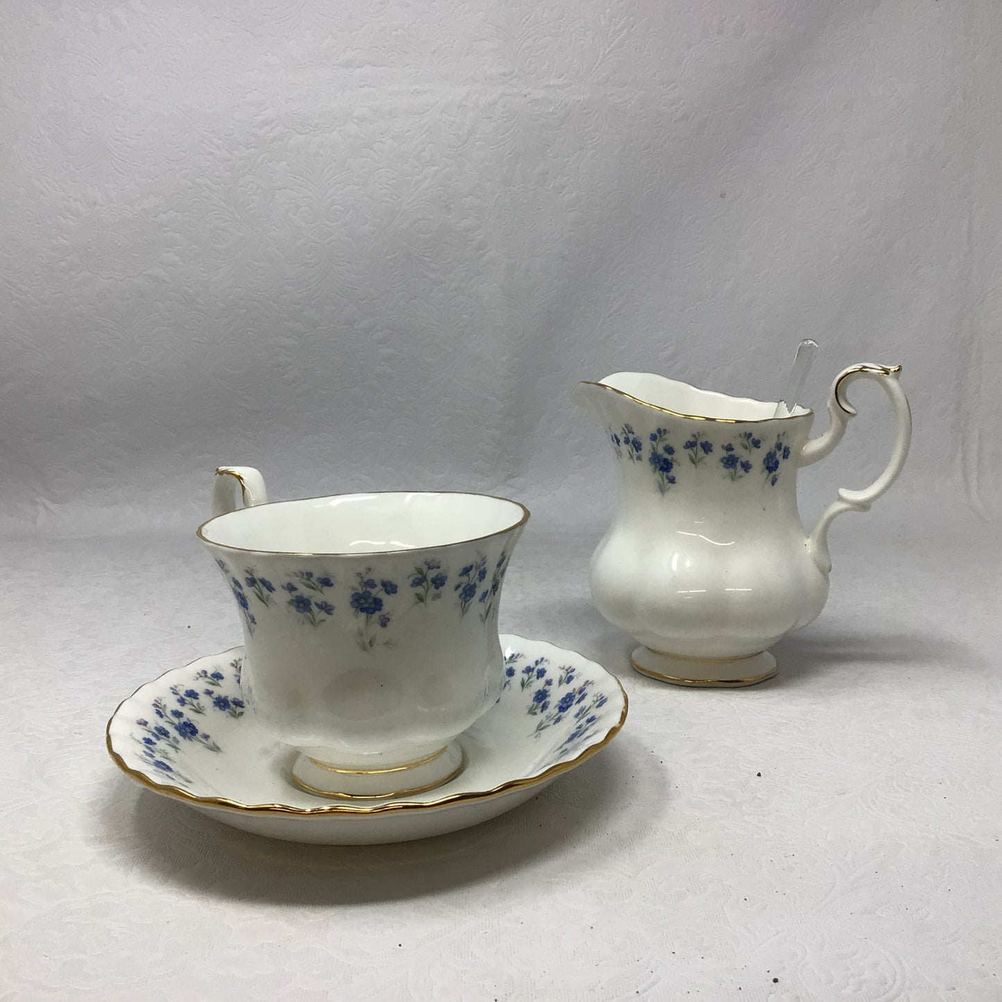 Royal Albert “Memory Lane” 12-piece Tea Cups and Saucers with Creamer