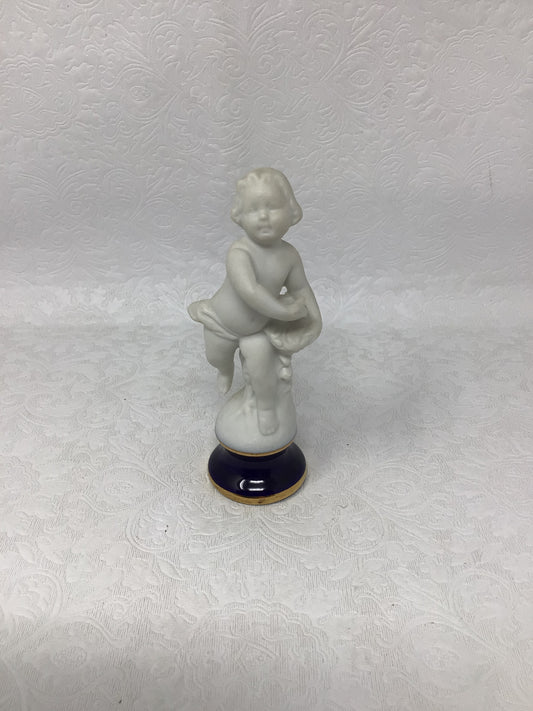 Porcelain Child Figurine